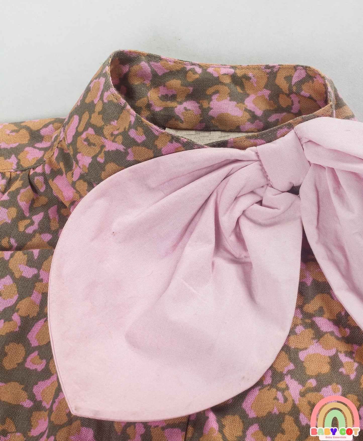 Cotton Woven Sleeveless Abstract Printed Bow Applique Detailed Top - Brown